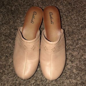 Slip on, wide heal, low profile boots